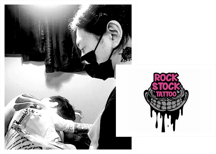Tattoo artist wearing a mask working on a person's back, accompanied by the "Rock Stock Tattoo" logo with a dripping smile design.