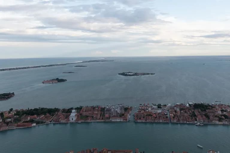 Aerial view of Venice, Italy with surrounding islands and water.